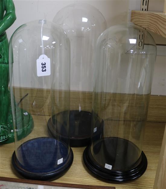 Three glass display domes